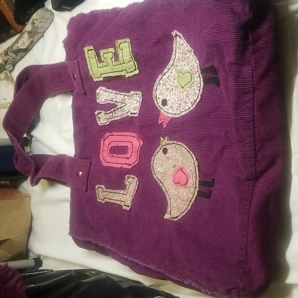 Purple purse with embroidery